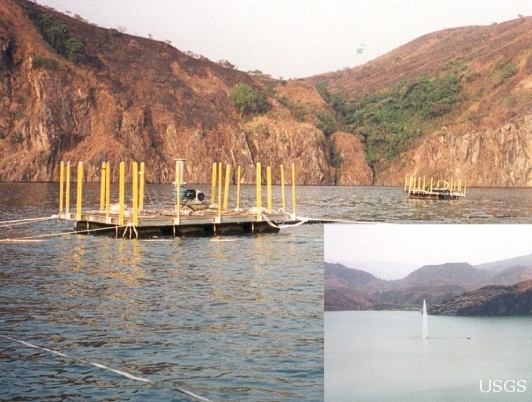 Photograph of two rafts each with a central pipe used for degassing lake Nyos.