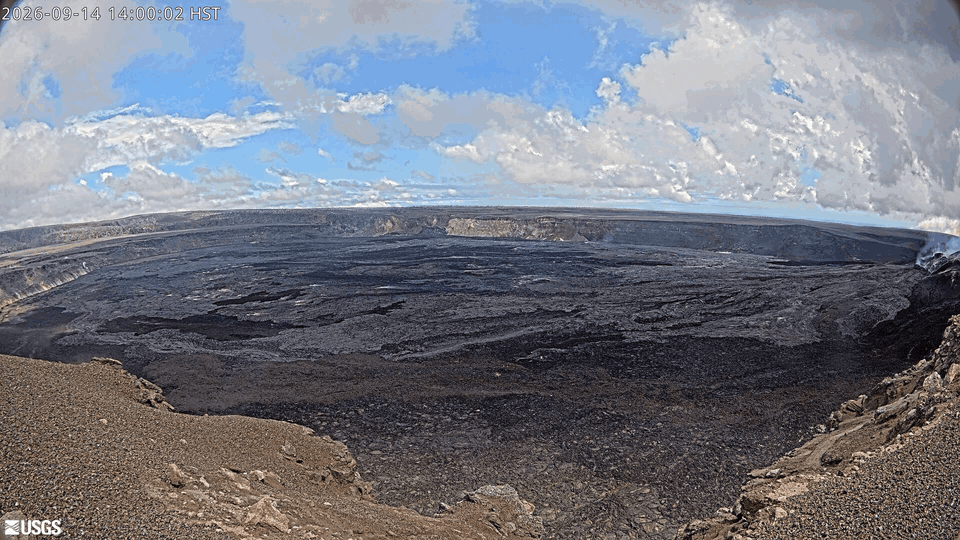 Color animated gif of webcam imagery showing lava flow at night