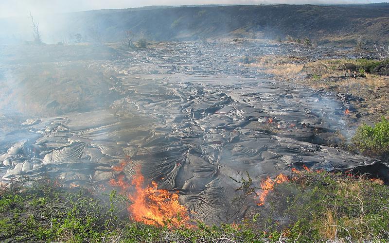 Lava tongue moving across coastal flat