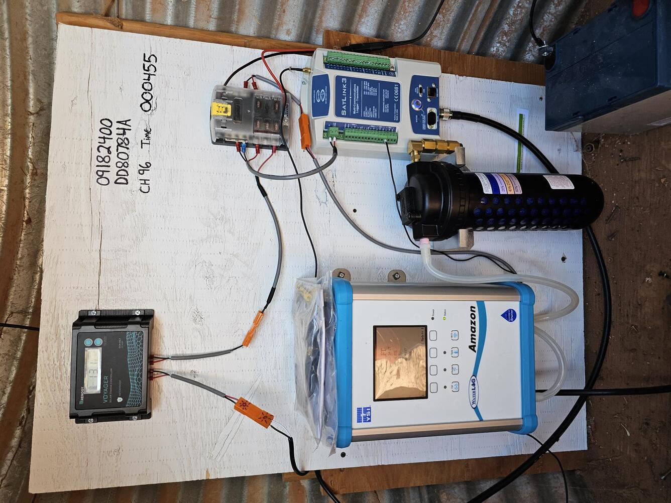 View of instrumentation inside of a corrugated galvanized steel gage house.