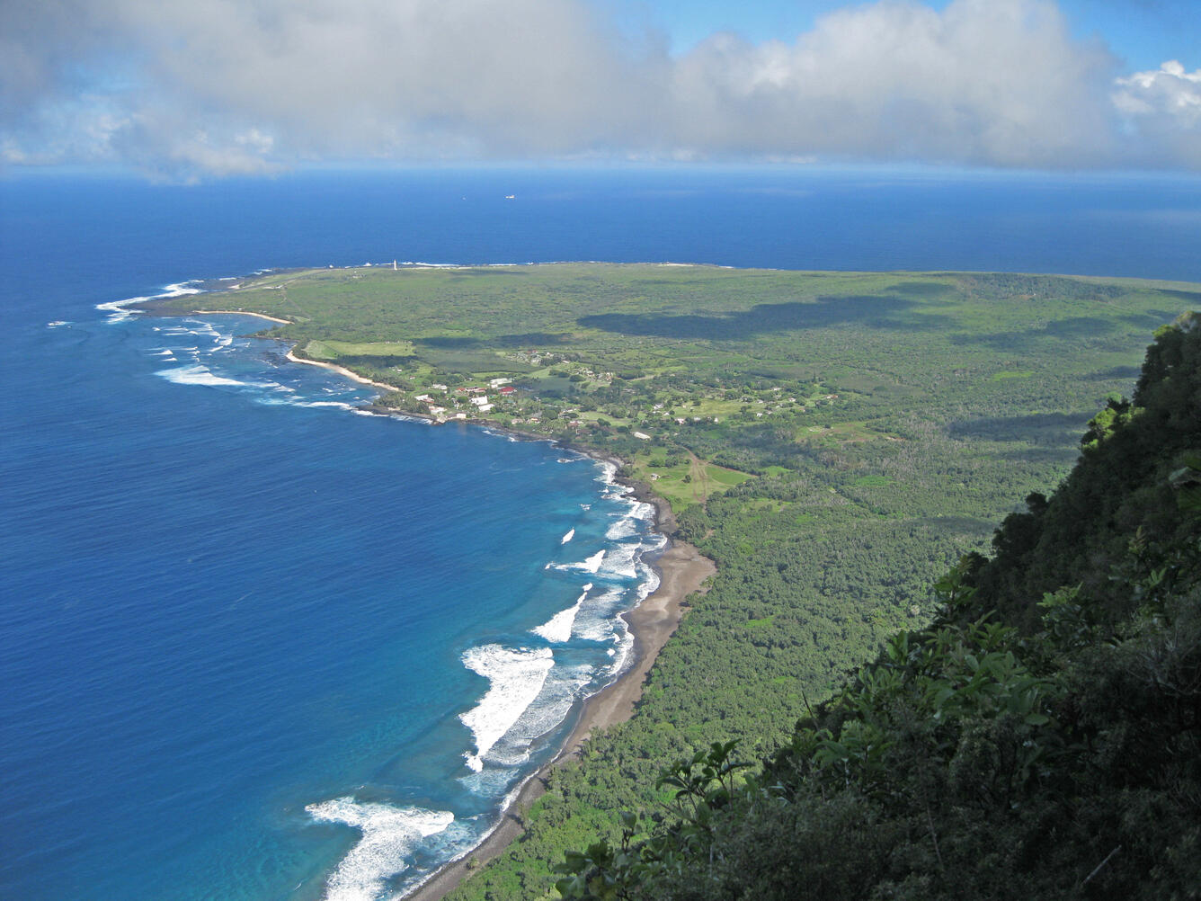 Photo looking down at Kaluapapa Peninsula and settlement on Moloka'i