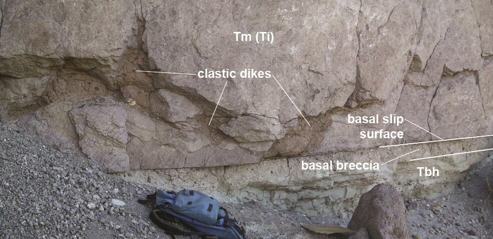 Backpack next to rock outcrop