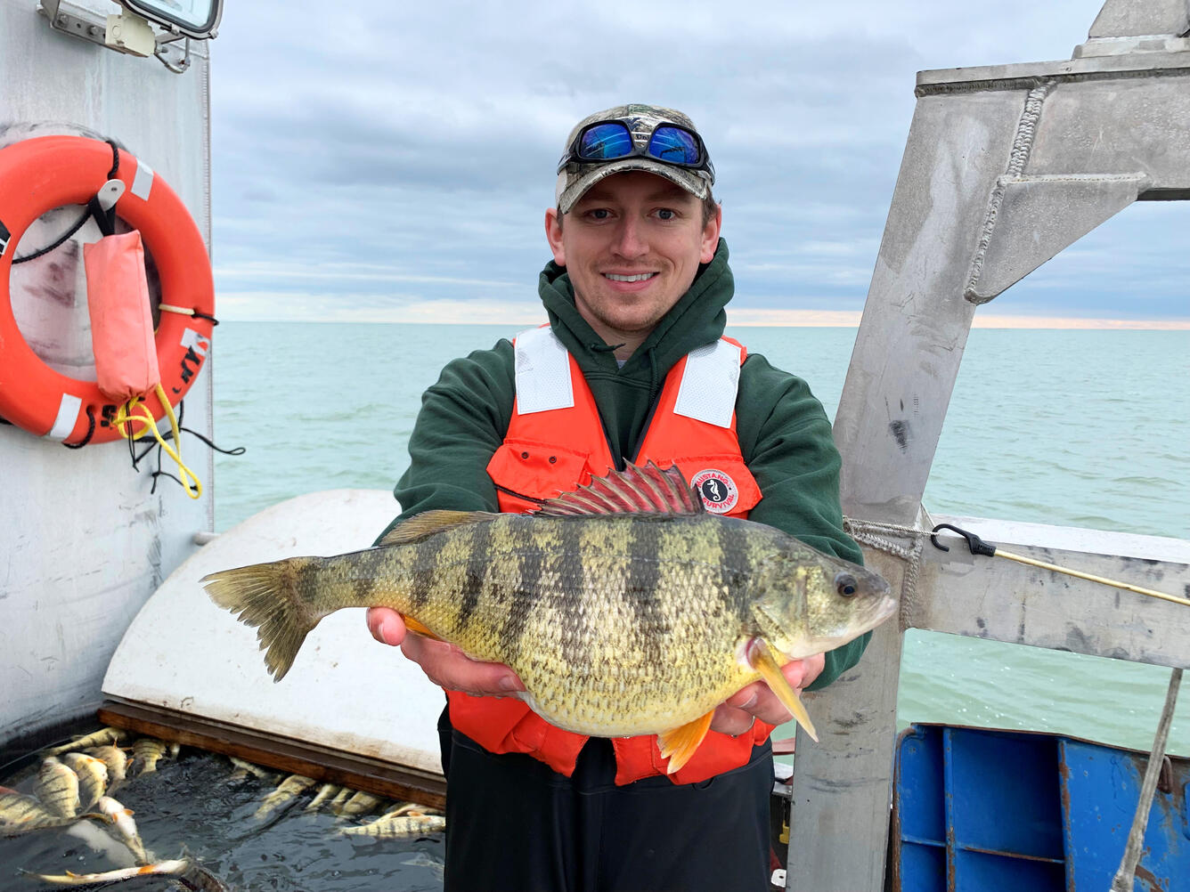 Corbin Hilling holding a yellow perch