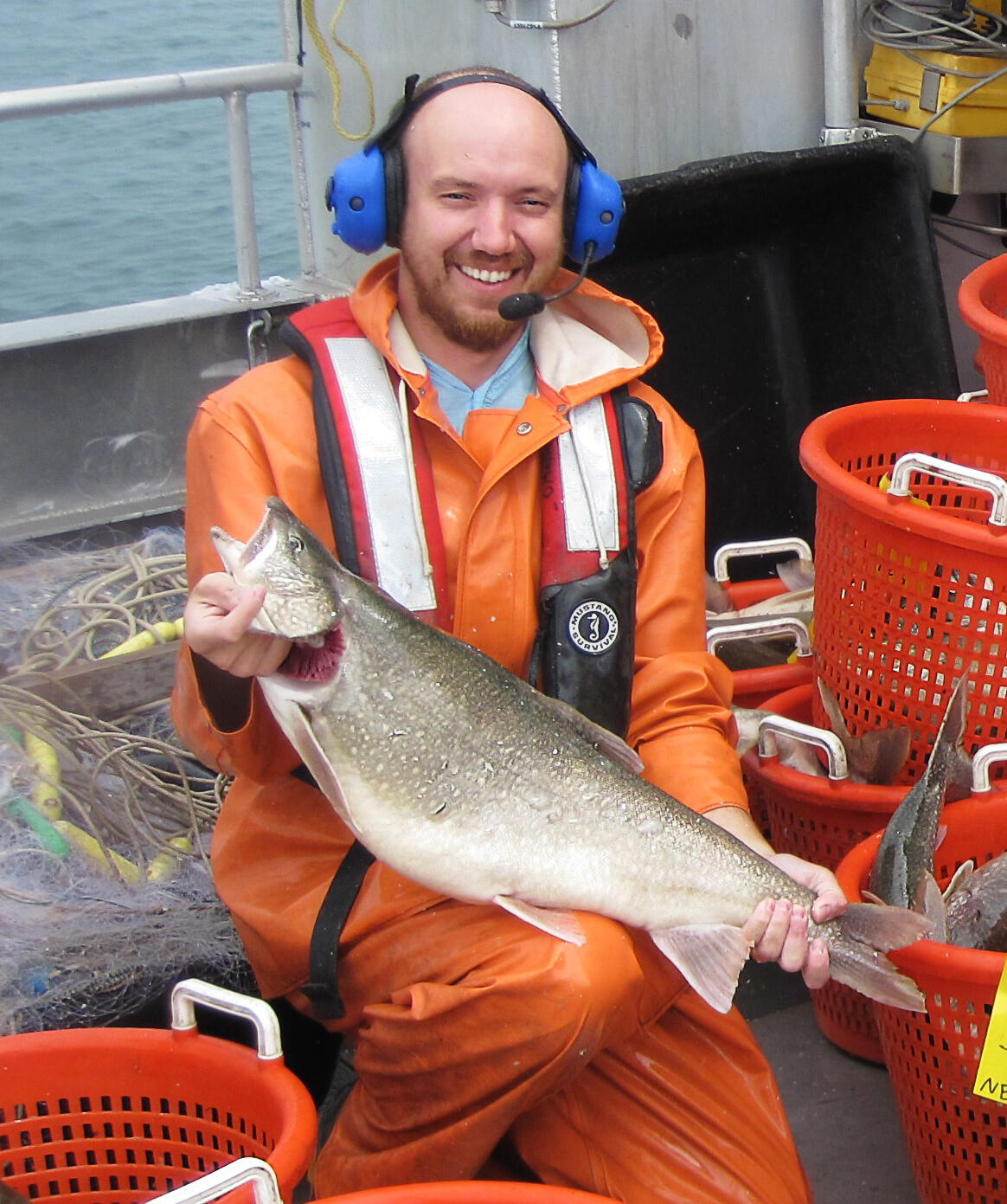 Brian O'Malley holding a lake trout