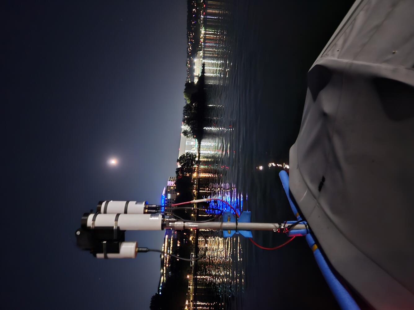 light sensor attached to boat on the water at Lake Washington at night