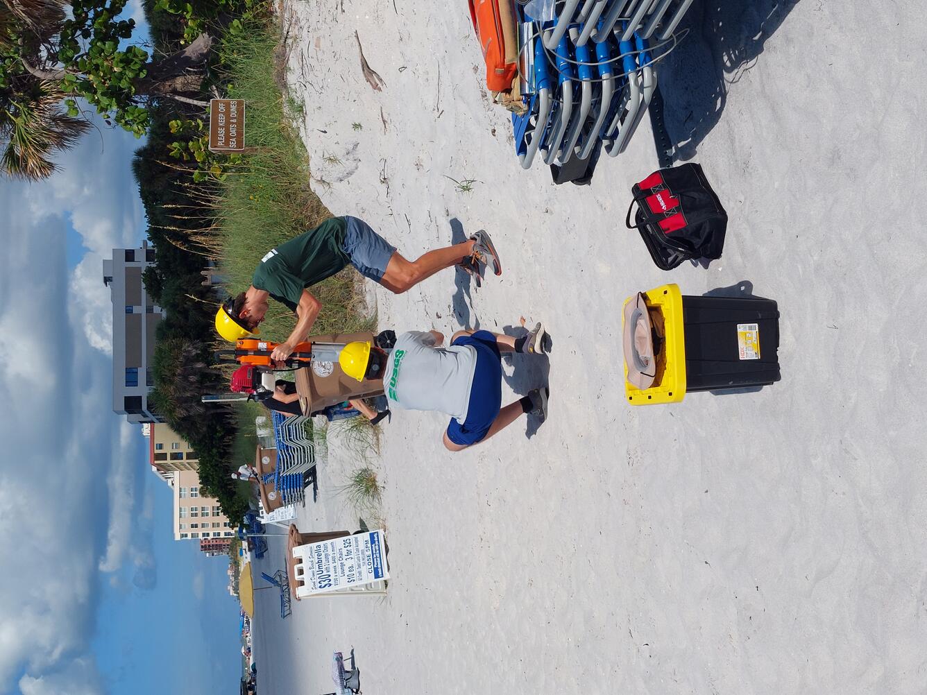 USGS Scientists installing support post