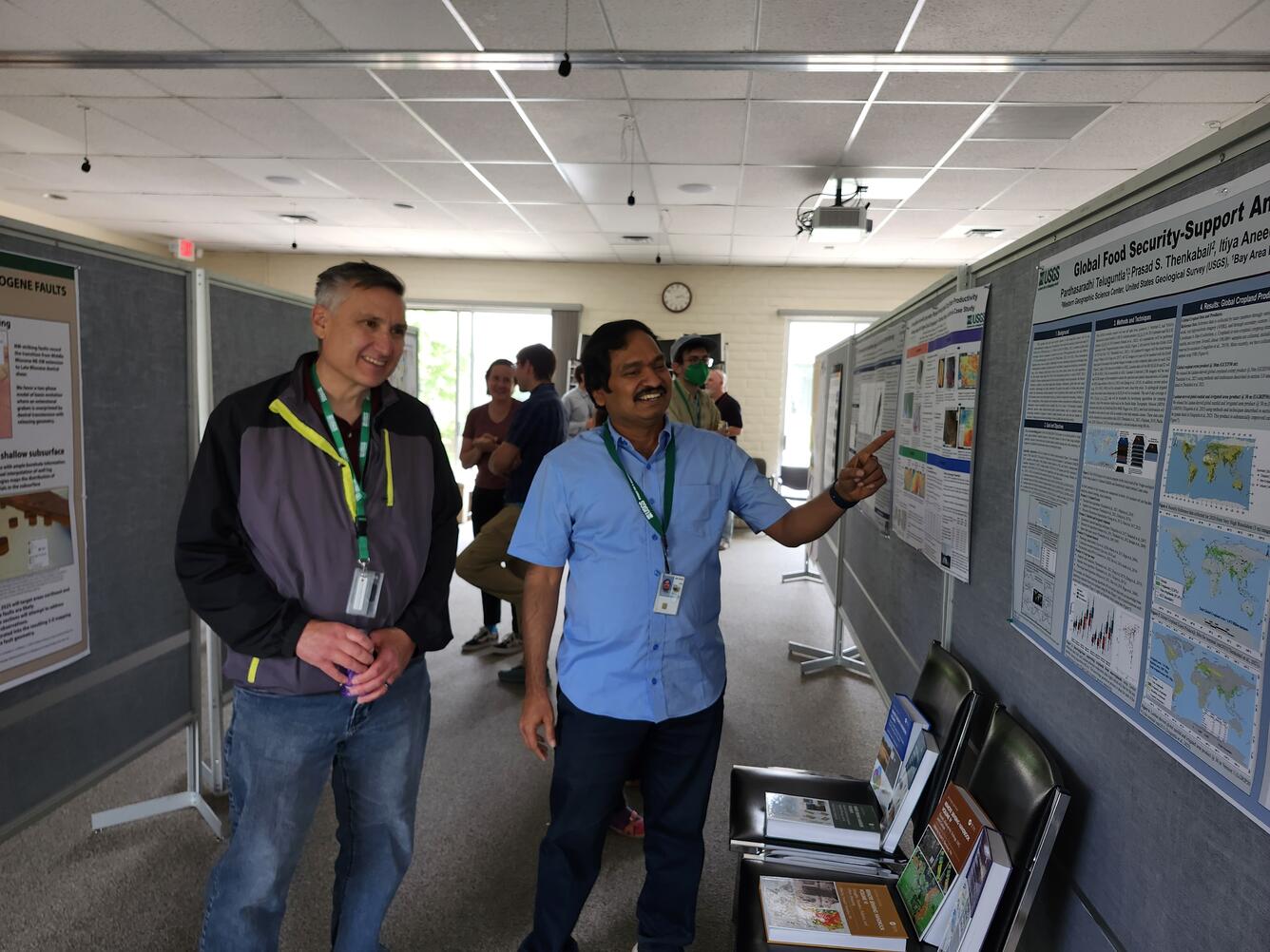 Flagstaff  Science Campus members at the Poster Social sharing their research