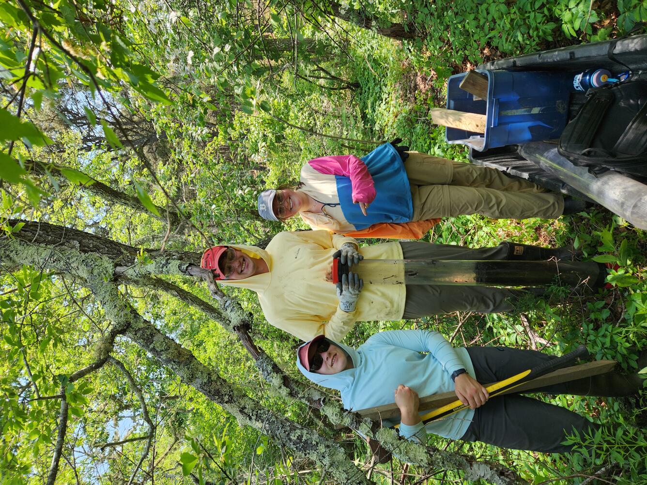 Interns working in a coastal wetland