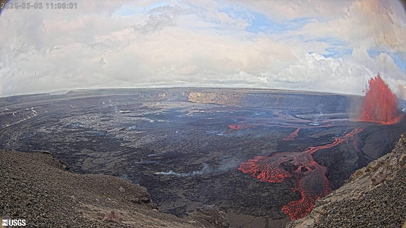 Color webcam image showing lava fountaining and lava flows within a volcanic crater