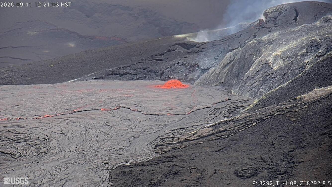 Color photograph of dome lava fountain erupting from a volcanic vent