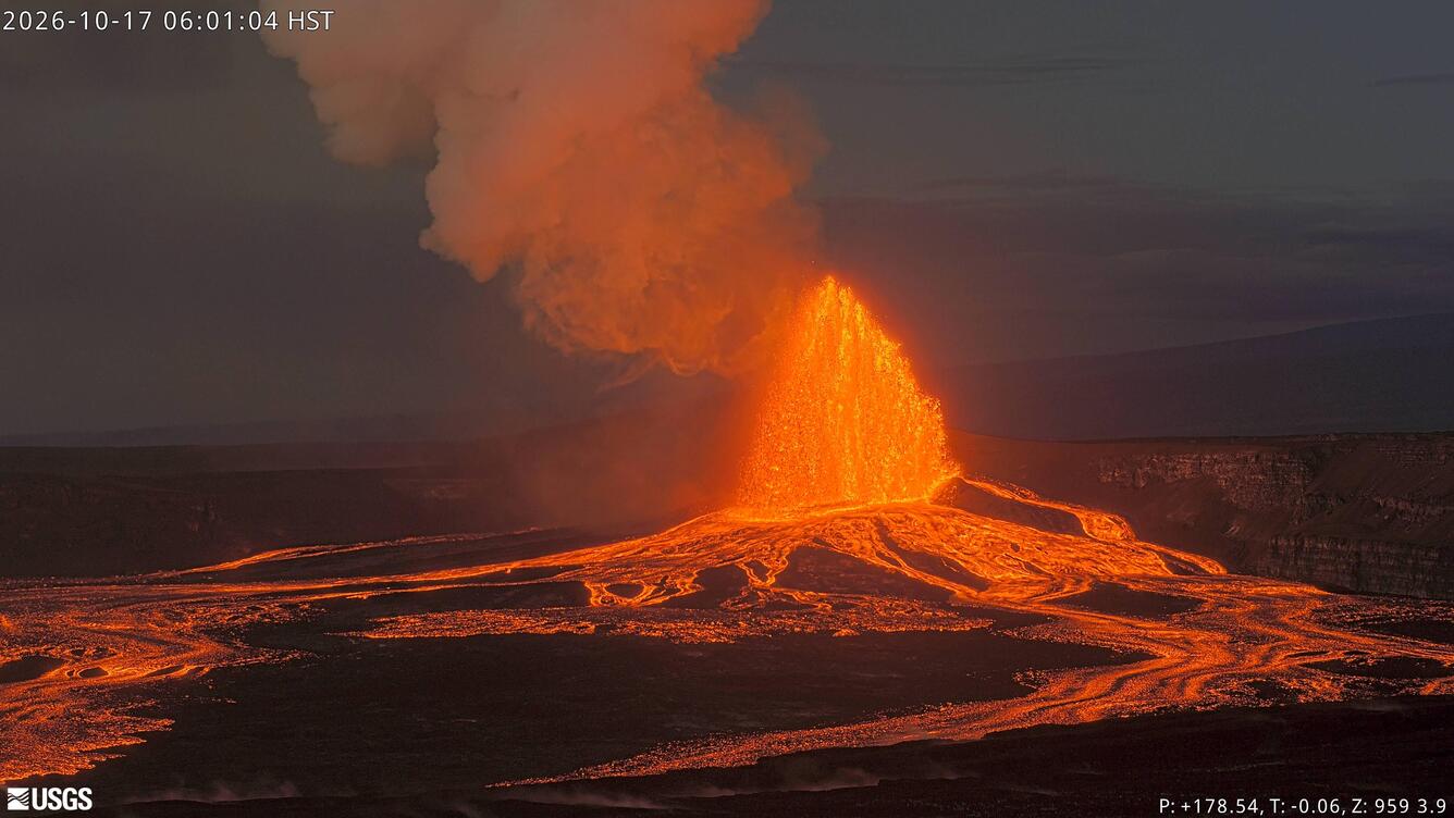 Color photograph of lava fountain and lava flows