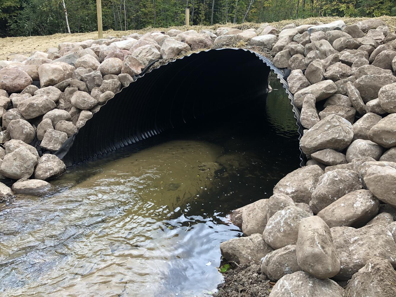 Looking through a new constructed culvert for fish passage