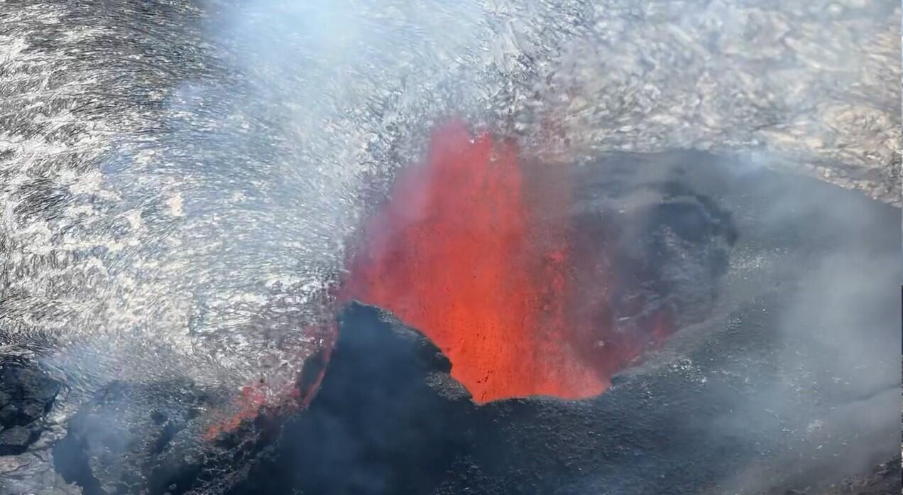Color photograph of erupting vent
