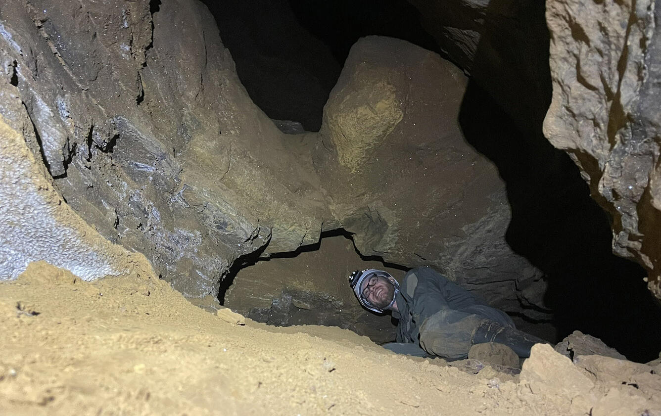 Geologist samples cave sediment