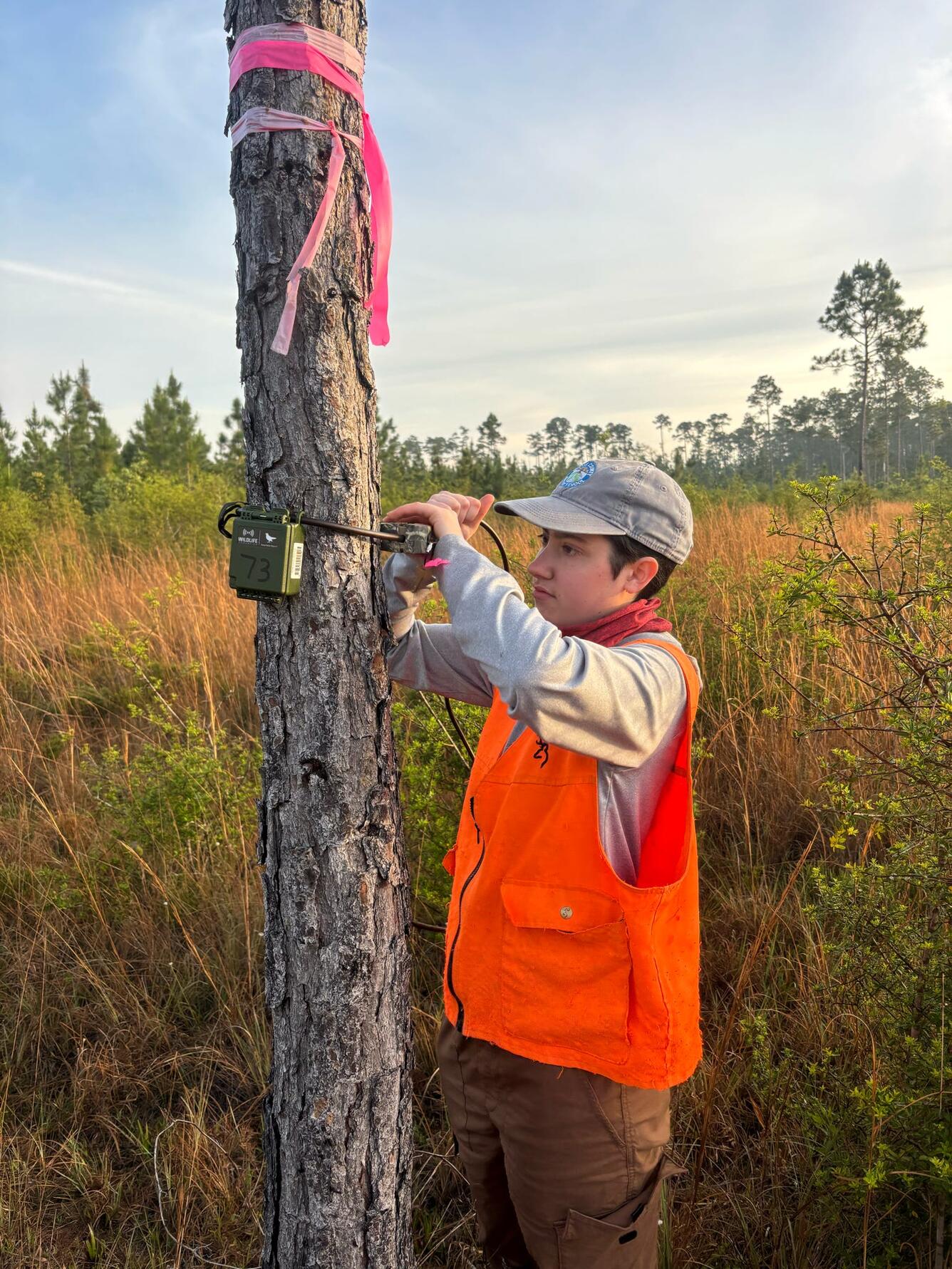 A researcher setting up an Autonomous Recording Unit
