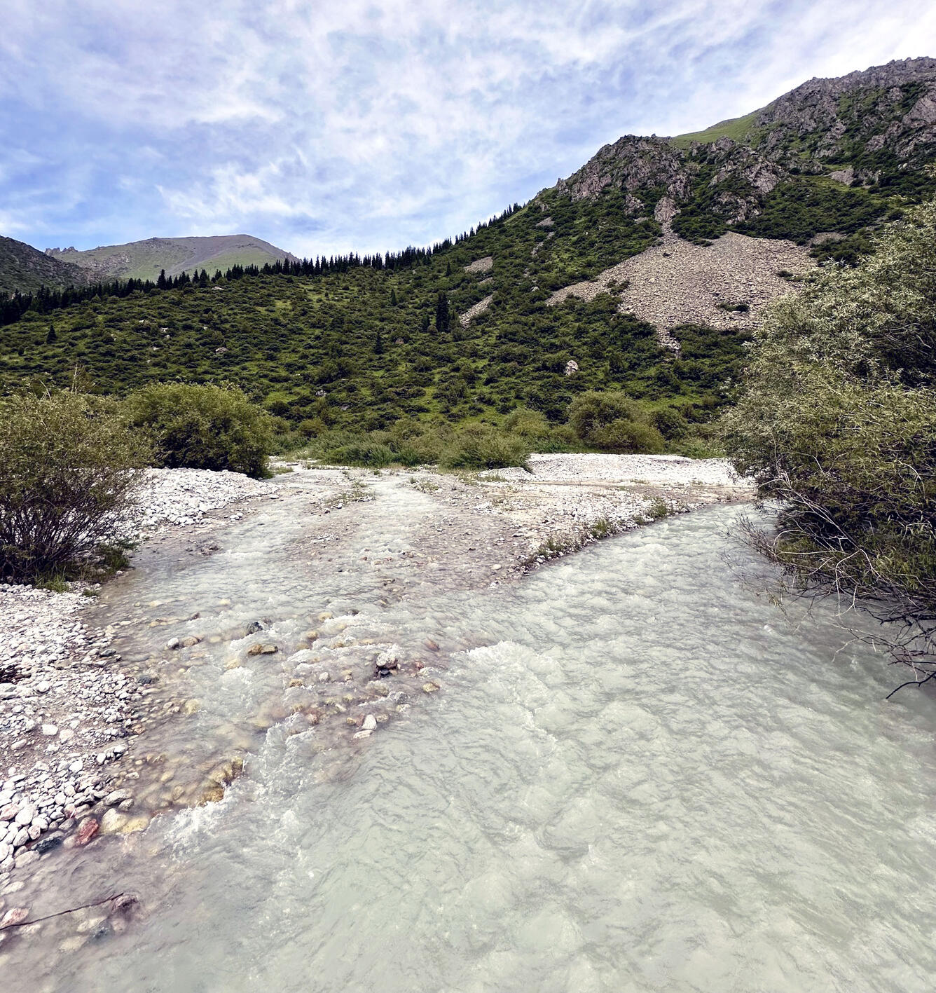 A glacier-fed river flows though Ala-Archa National Park in the Chuy Region of the Kyrgyz Republic