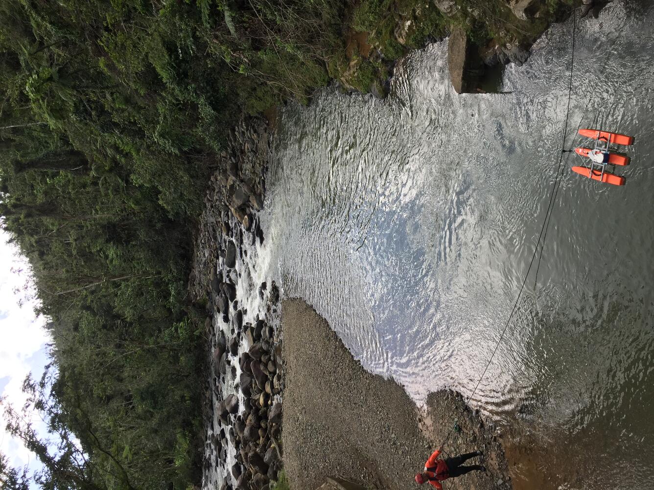 Photo of Angel J. Torres-Sánchez (now retired) of Caribbean-Florida Water Science Ctr measuring discharge on the Río Mameyes