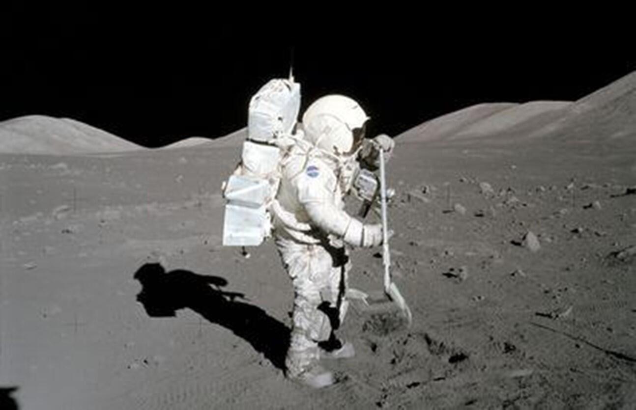 Astronaut Jack Schmitt collecting lunar samples 