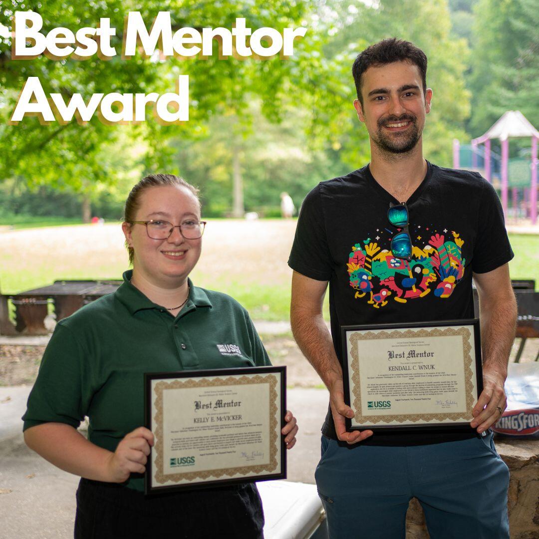 Kelly McVicker and Kendall Wnuk pose for a photo with award plaques.