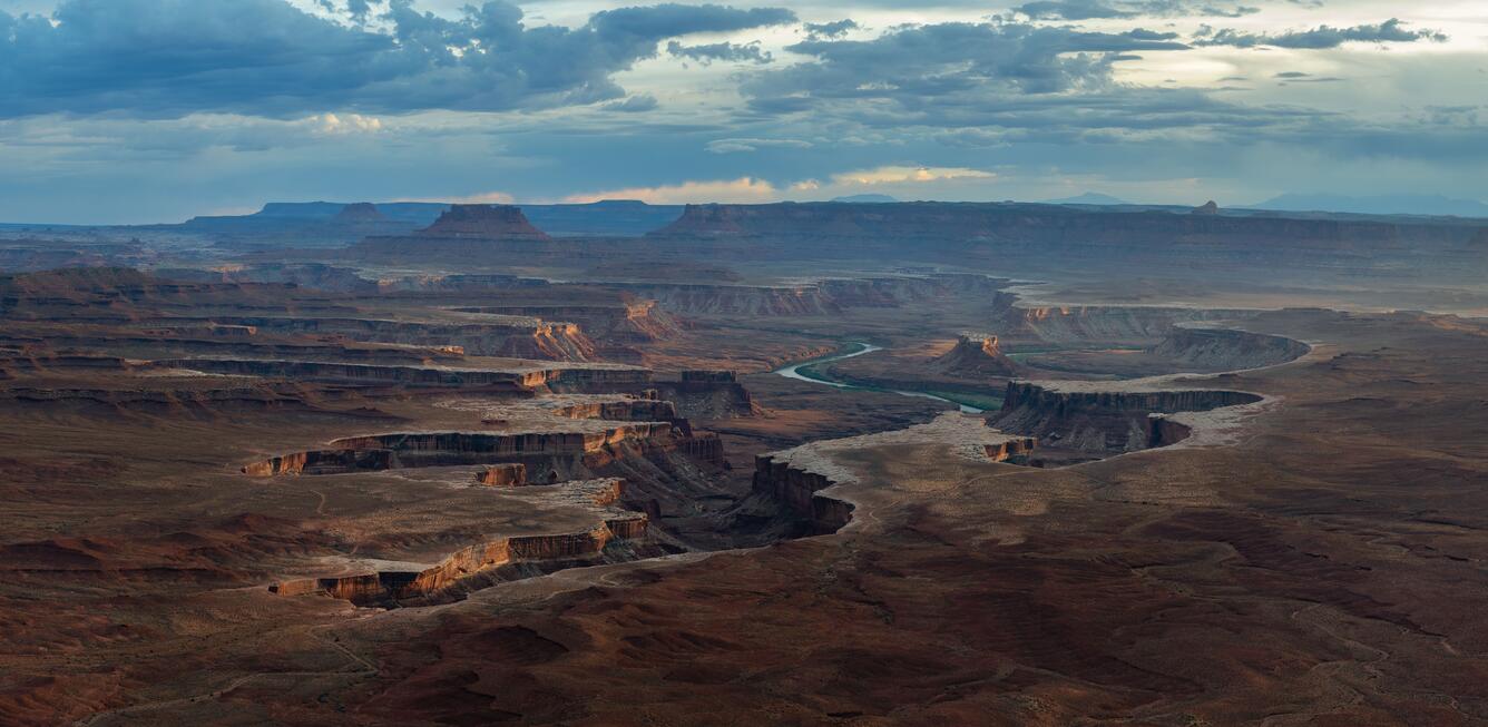 photo of a river snaking through a canyon
