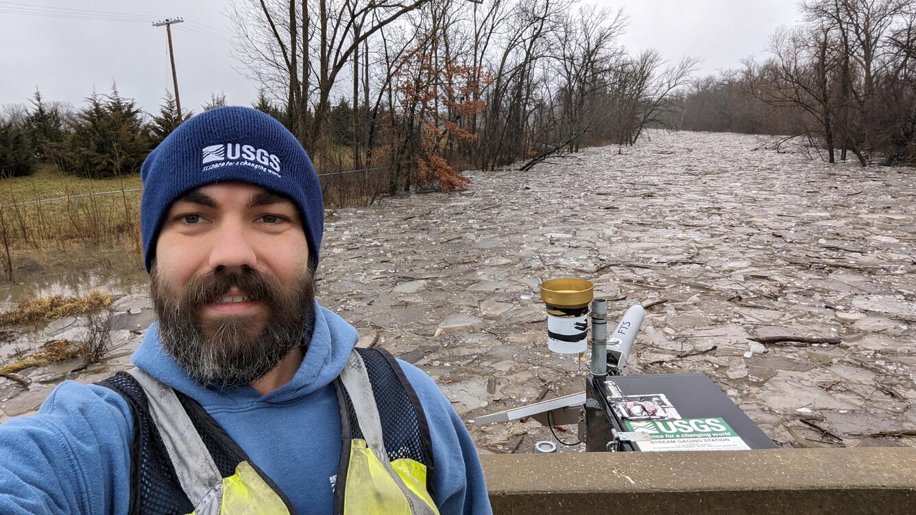Christopher out in the field working. 