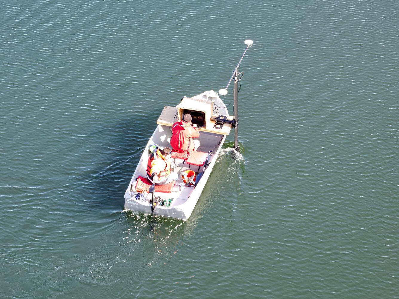 aerial view of small boat on pond