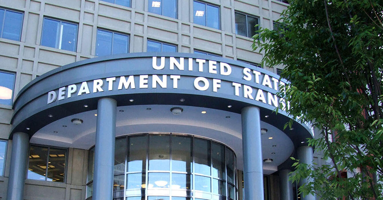 glass round dome with the words Department of Transportation written above