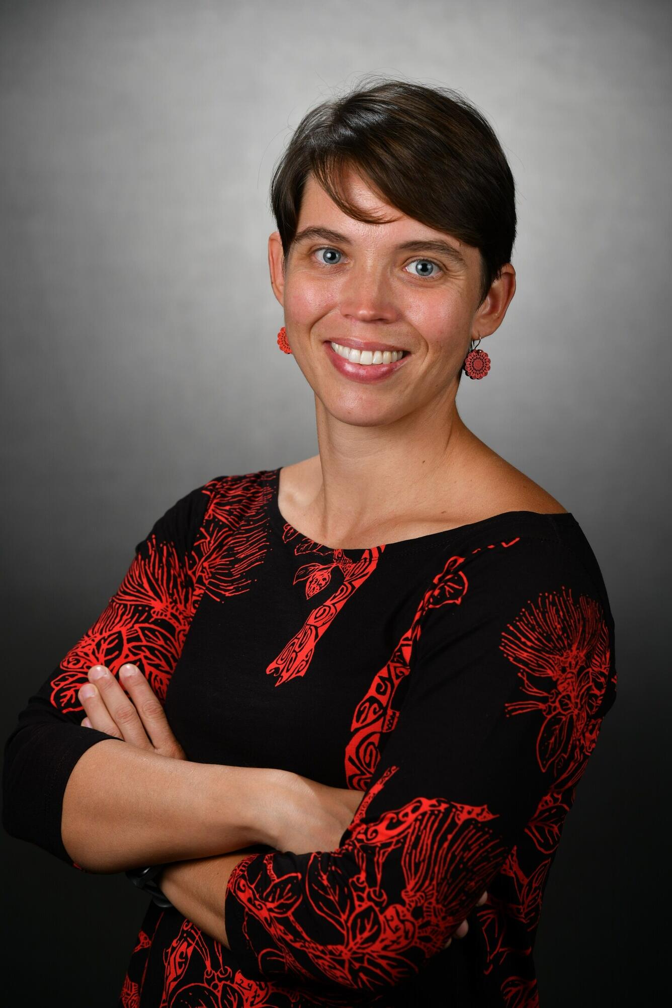 Color photograph of a scientist taken in a photographer studio