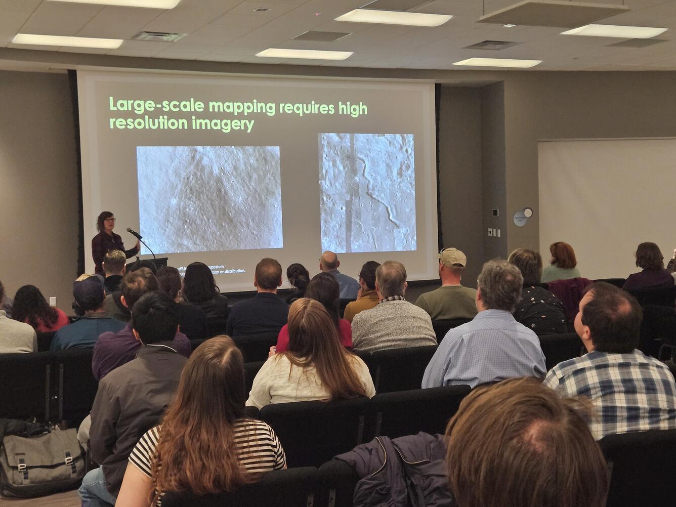 This is a photo of Rachel Fry giving a lecture at LPSC in 2025.