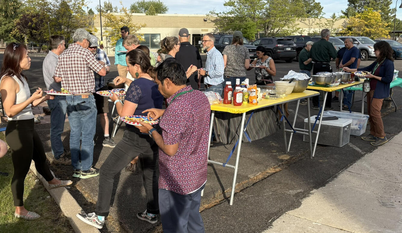This photo shows Flagstaff Science Campus employees with the Director's Office at the campus barbecue 