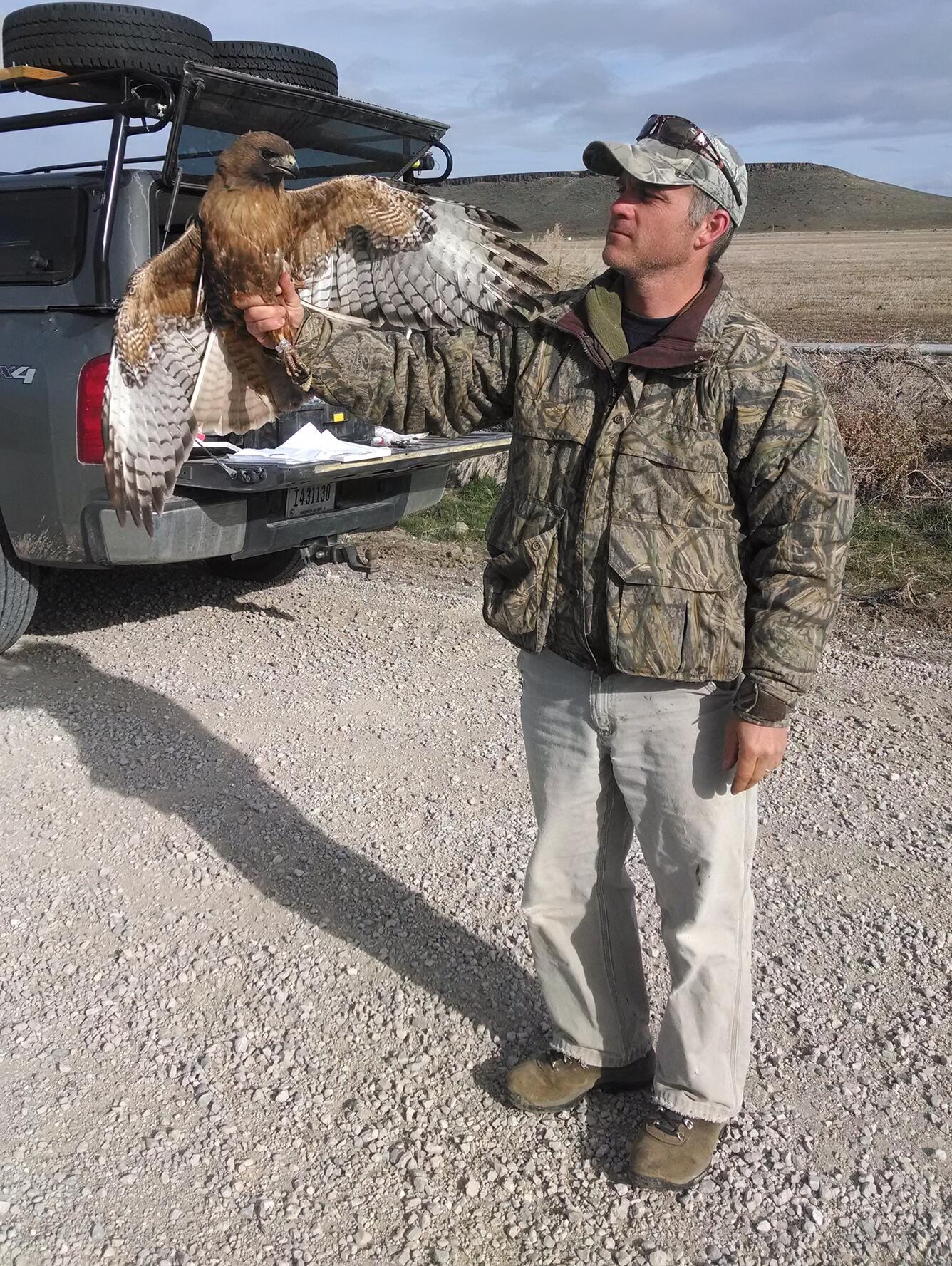 Garth Herring holding a golden eagle