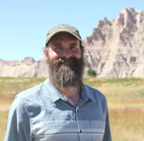 Portrait of Gregor Schuurman in Badlands National Park.