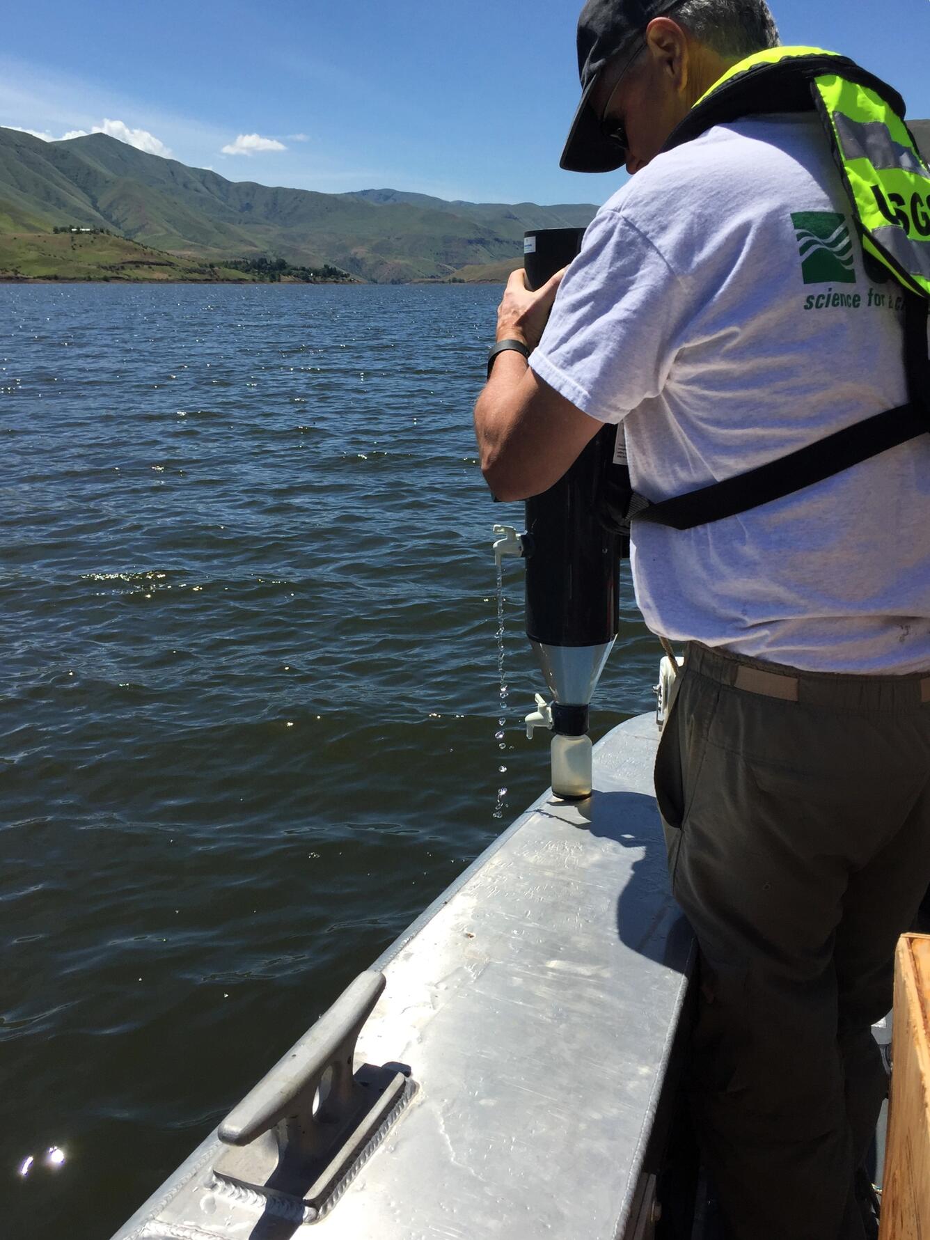 USGS scientists deploys sediment in a canyon reservoir