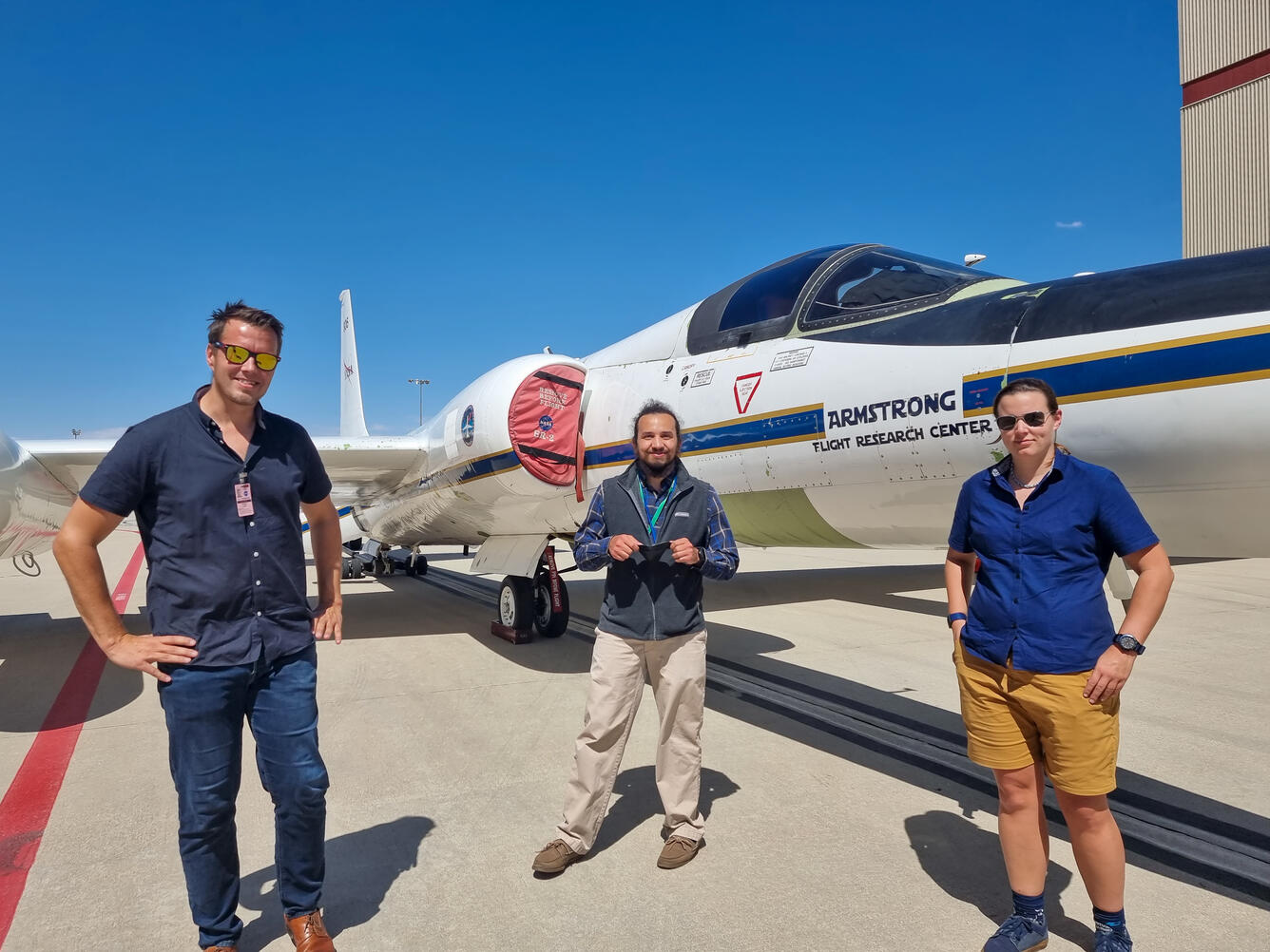 USGS and Norsk Elektro Optikk engineers with the NASA ER-2 aircraft for hyperspectral imaging sensor deployment