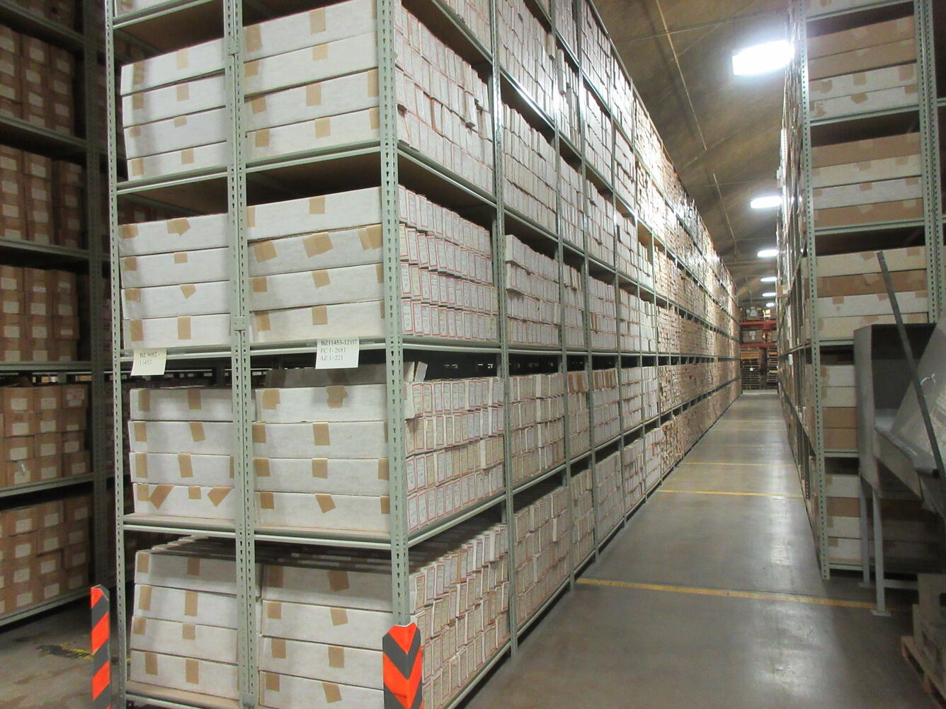 Boxes of drill cuttings on shelves at Core Research Center