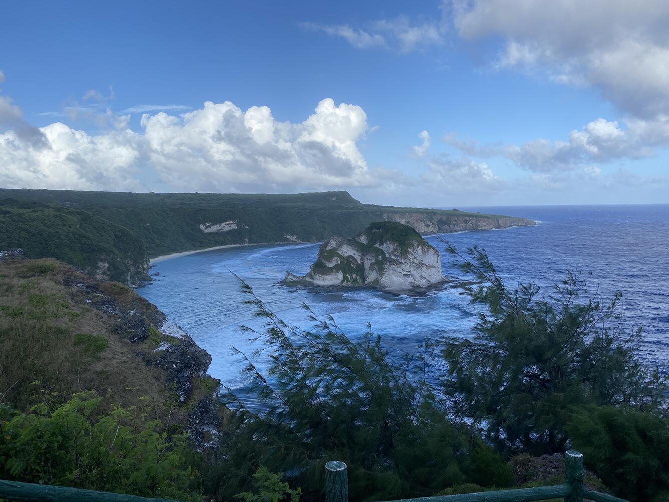 Scenic view of Bird Island surrounded by the ocean, and the northeast coast of Saipan.
