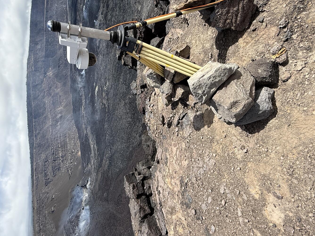 Color photograph of webcamera on the rim of a volcanic caldera
