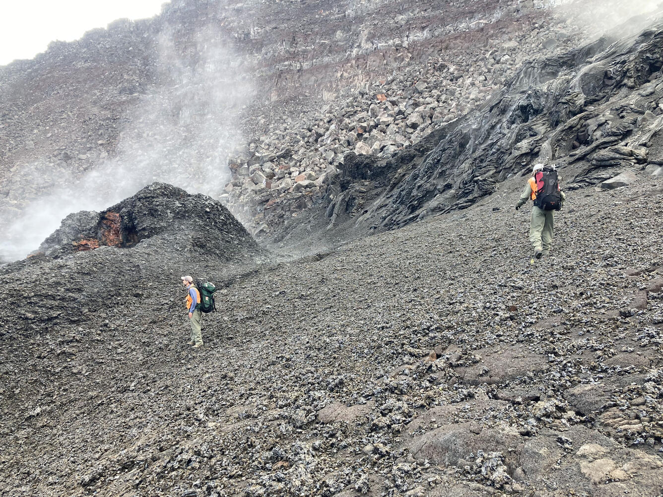 Color photographs of scientists hiking