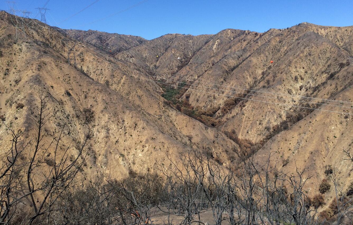 steep hillslopes with sparse vegetation