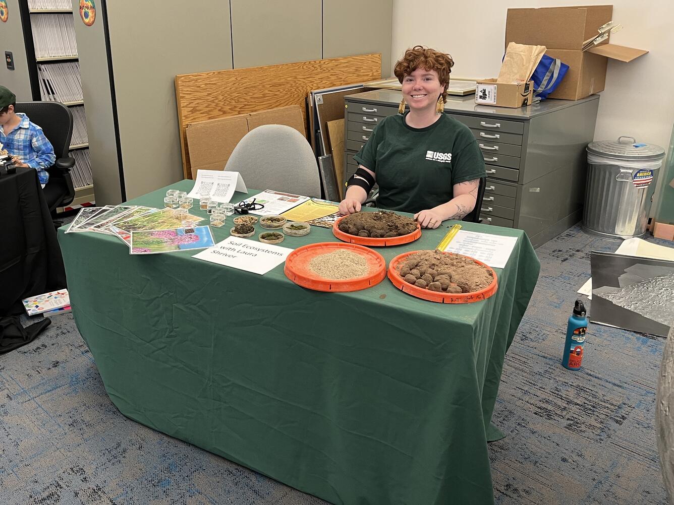 Laura Shriver at the soil and restoration science booth at the USGS Flagstaff Science Center Open House.