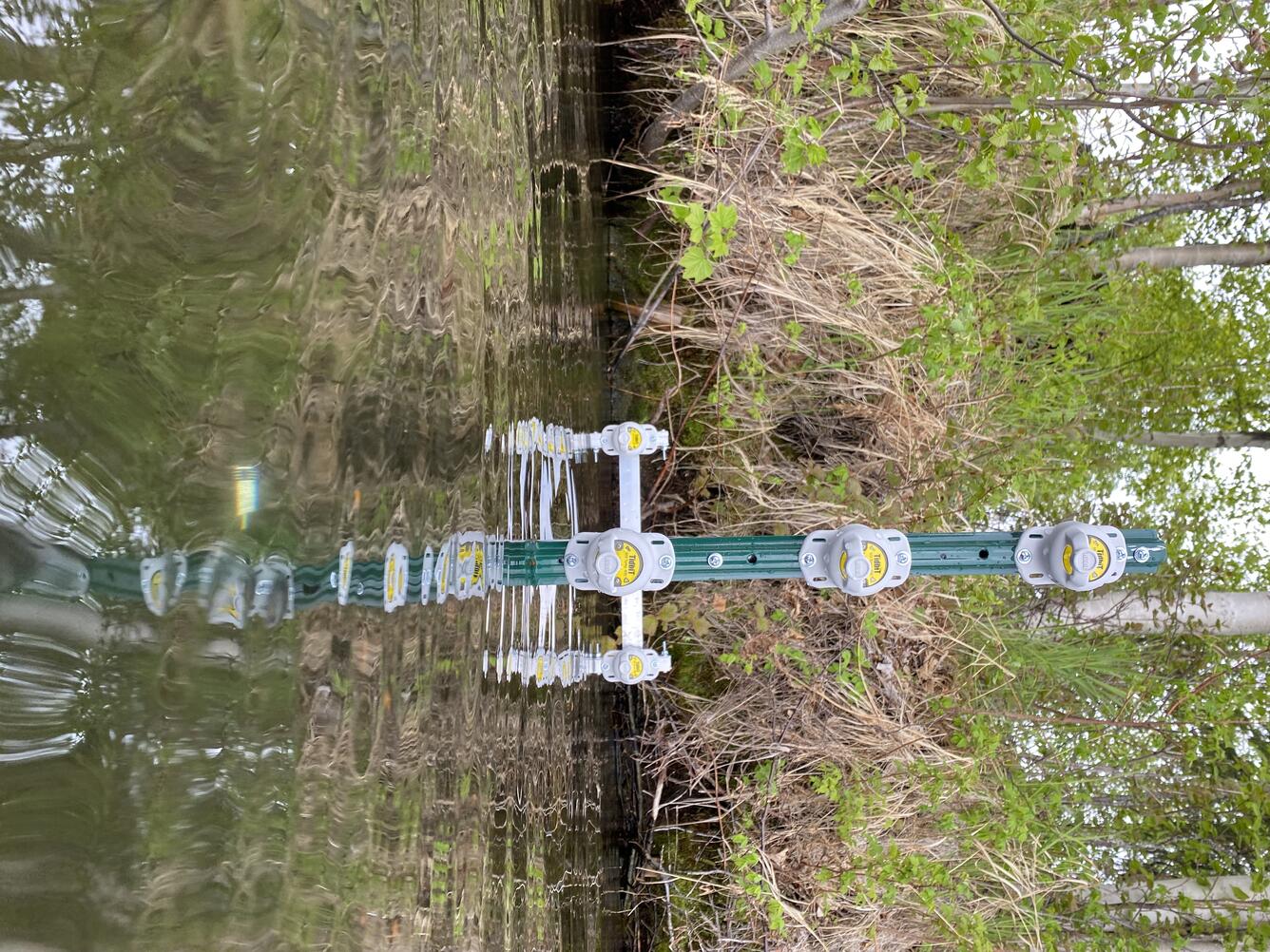 USGS researchers deploy a wake detection array at Big Lake, Alaska