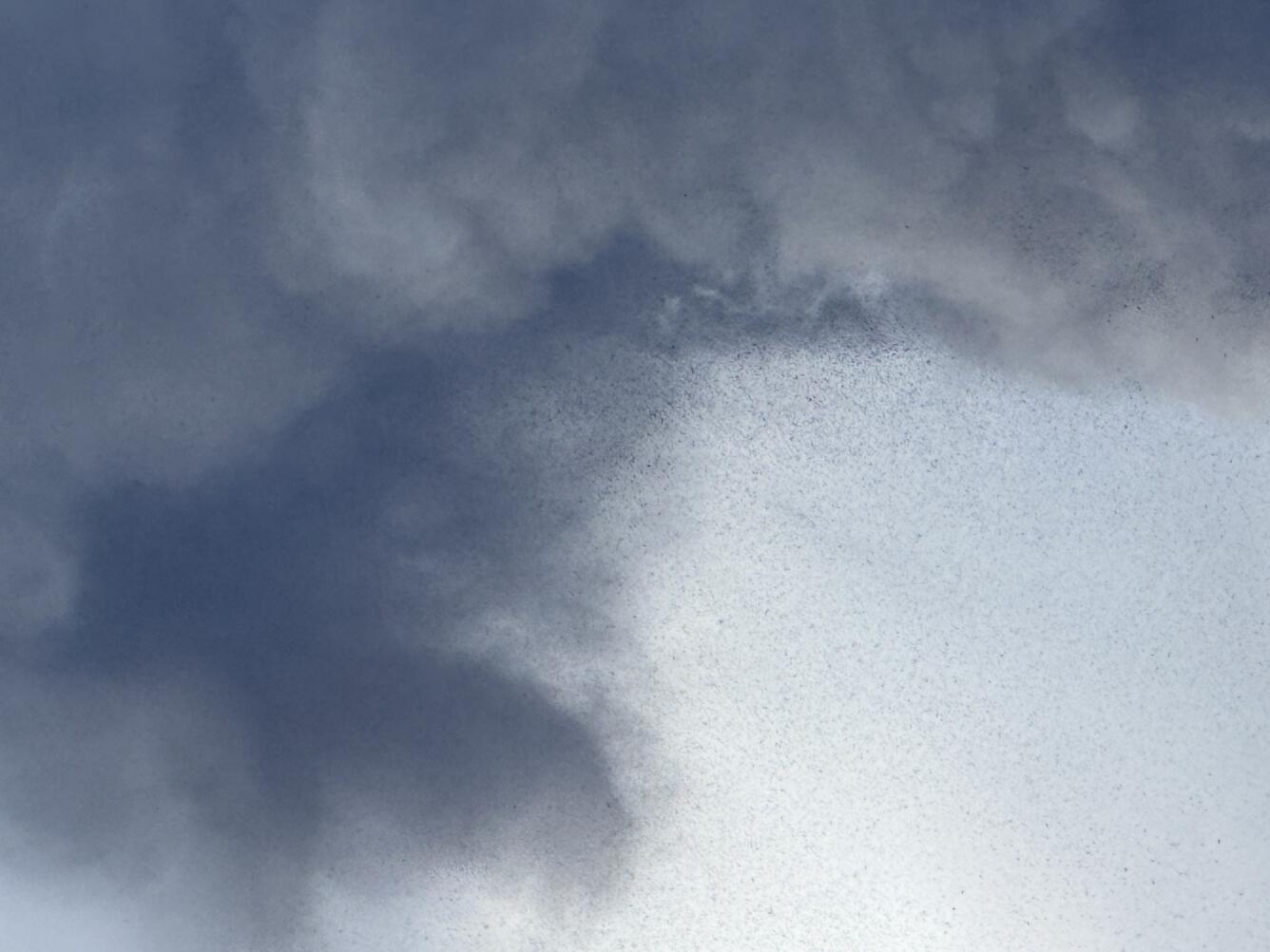 Color photograph of volcanic plume