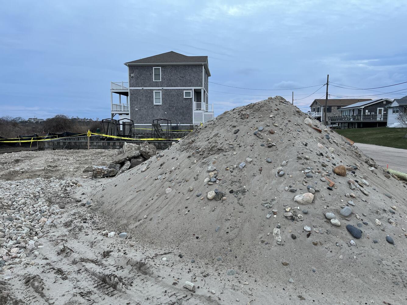 Pile of sand in neighborhood where house will be built
