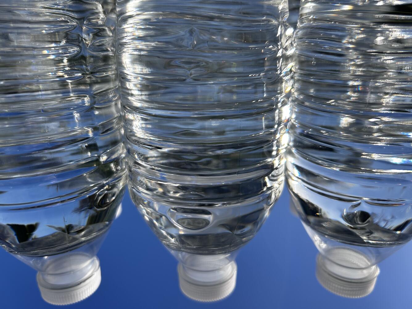 three plastic bottles