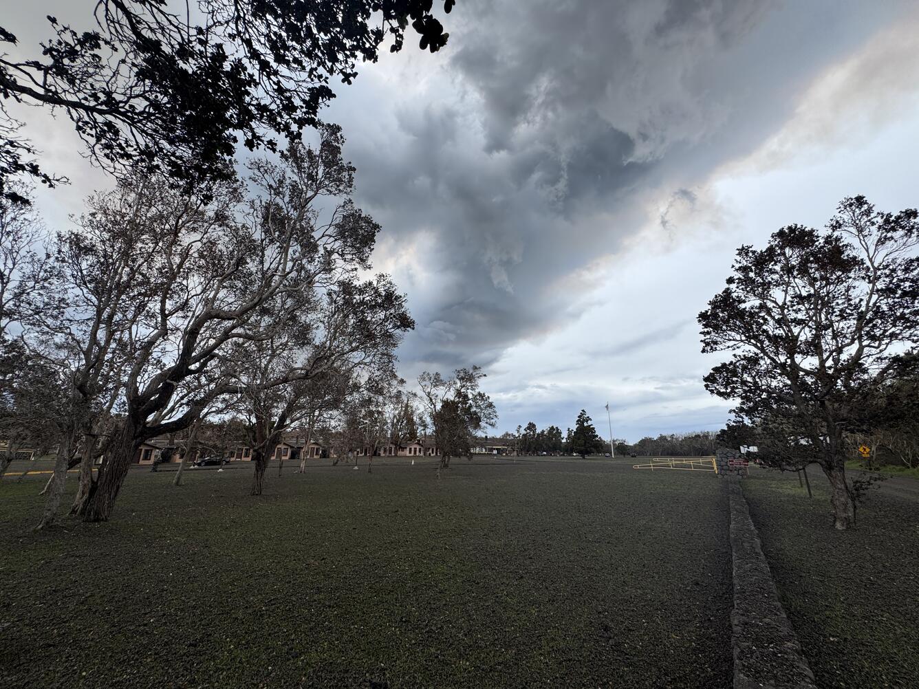 Color photograph of tephra and volcanic plume
