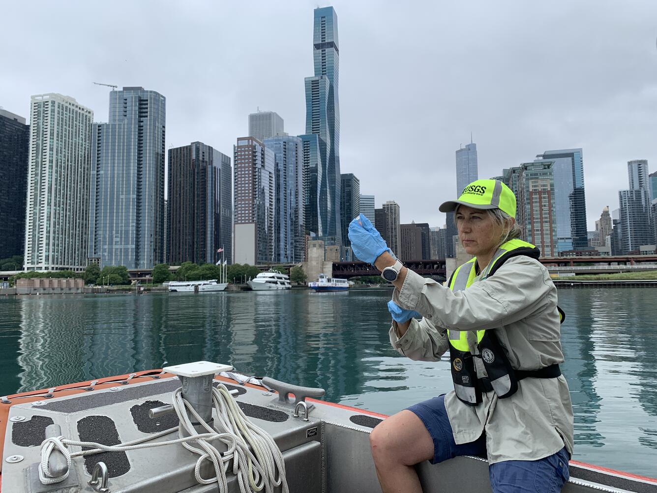 USGS scientist collects water sample in Chicago, IL