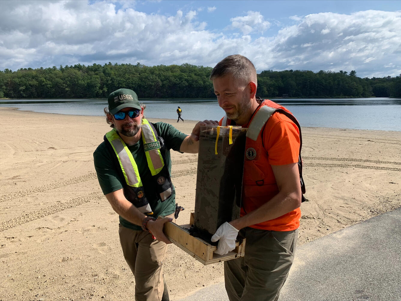 USGS scientists collect sediment core samples to study the history of cyanobacteria blooms in New York’s Moreau Lake.