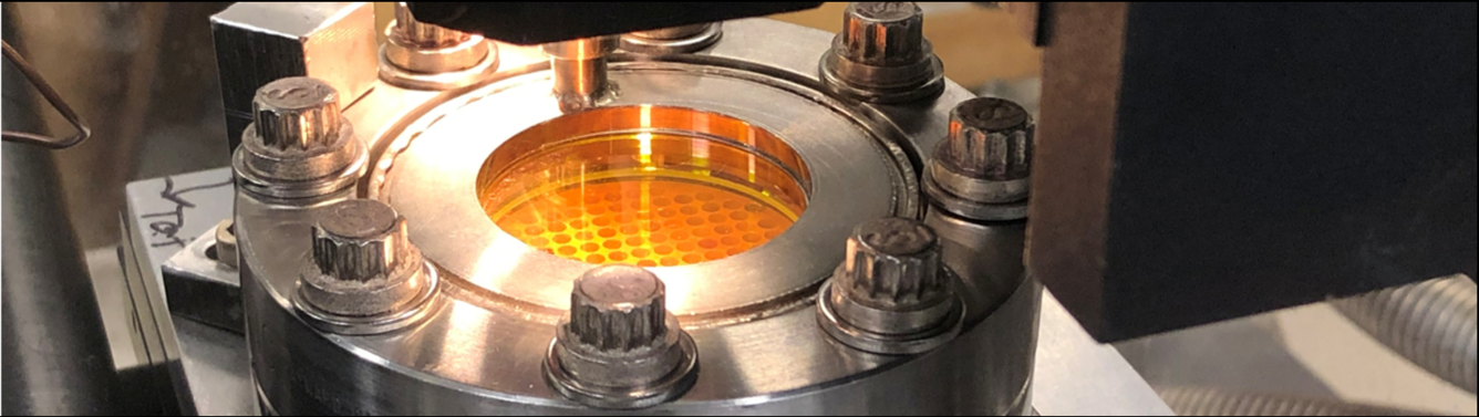 Photo of a doubly-pumped laser chamber with ZnSe window