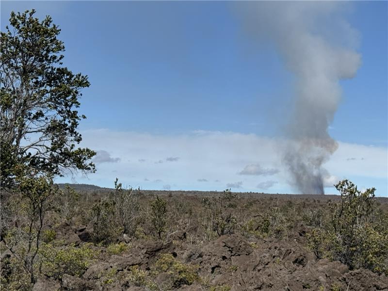 Color photograph of volcanic plume