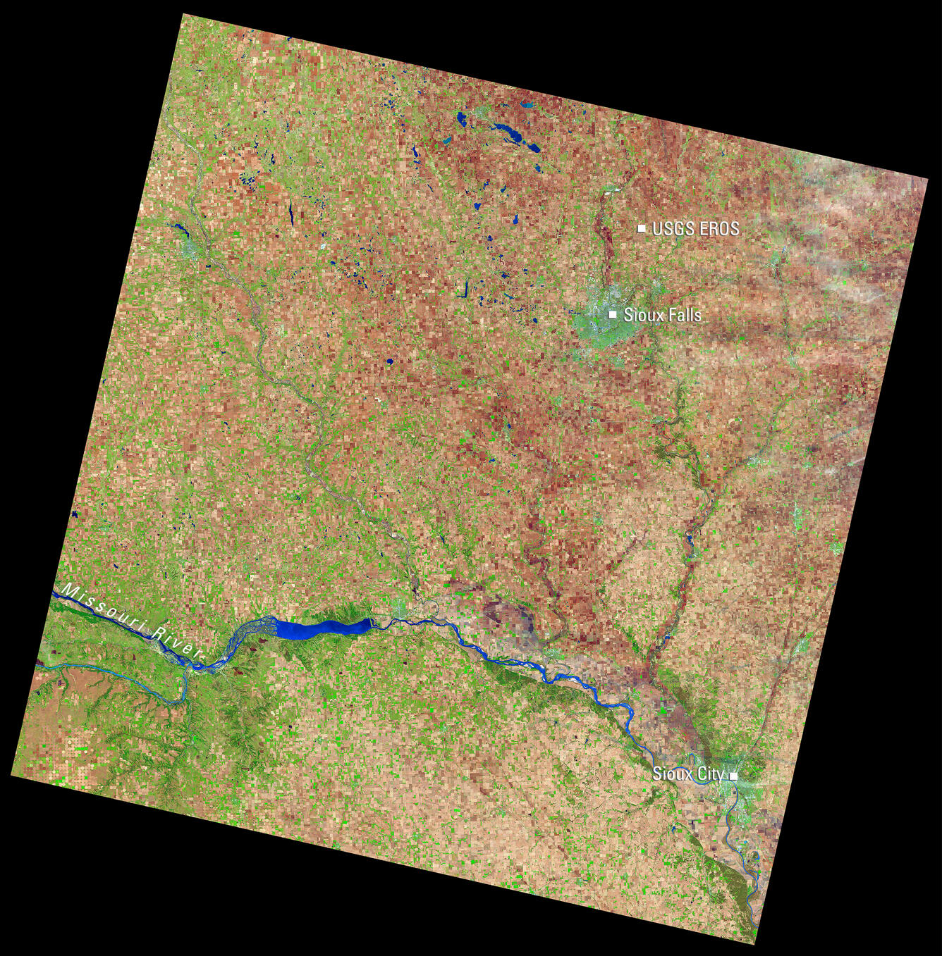 Satellite image of eastern South Dakota showing Sioux Falls, the USGS EROS Center, Sioux City, and the Missouri River.